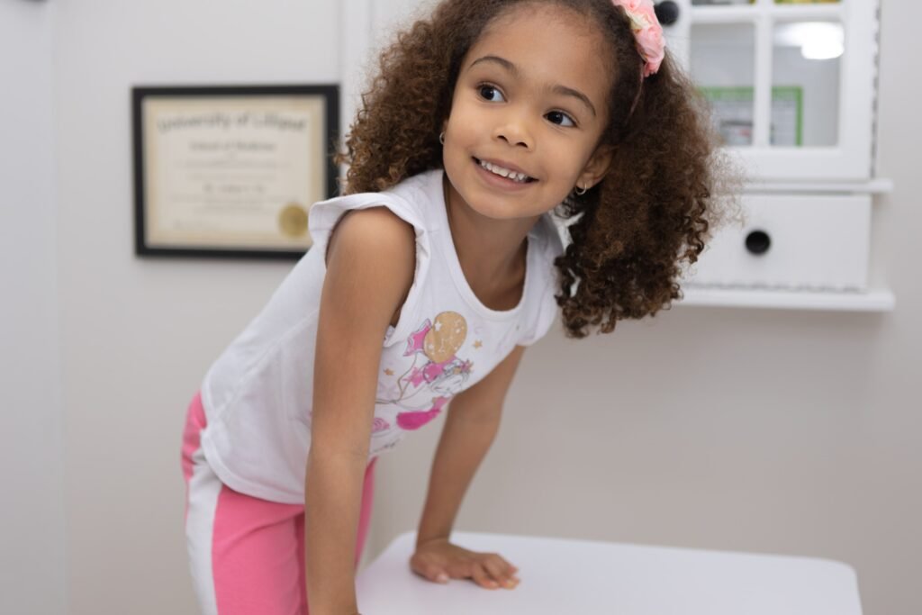 Kids playing at pretend veterinary clinic at Kids Hideout Fort Lauderdale