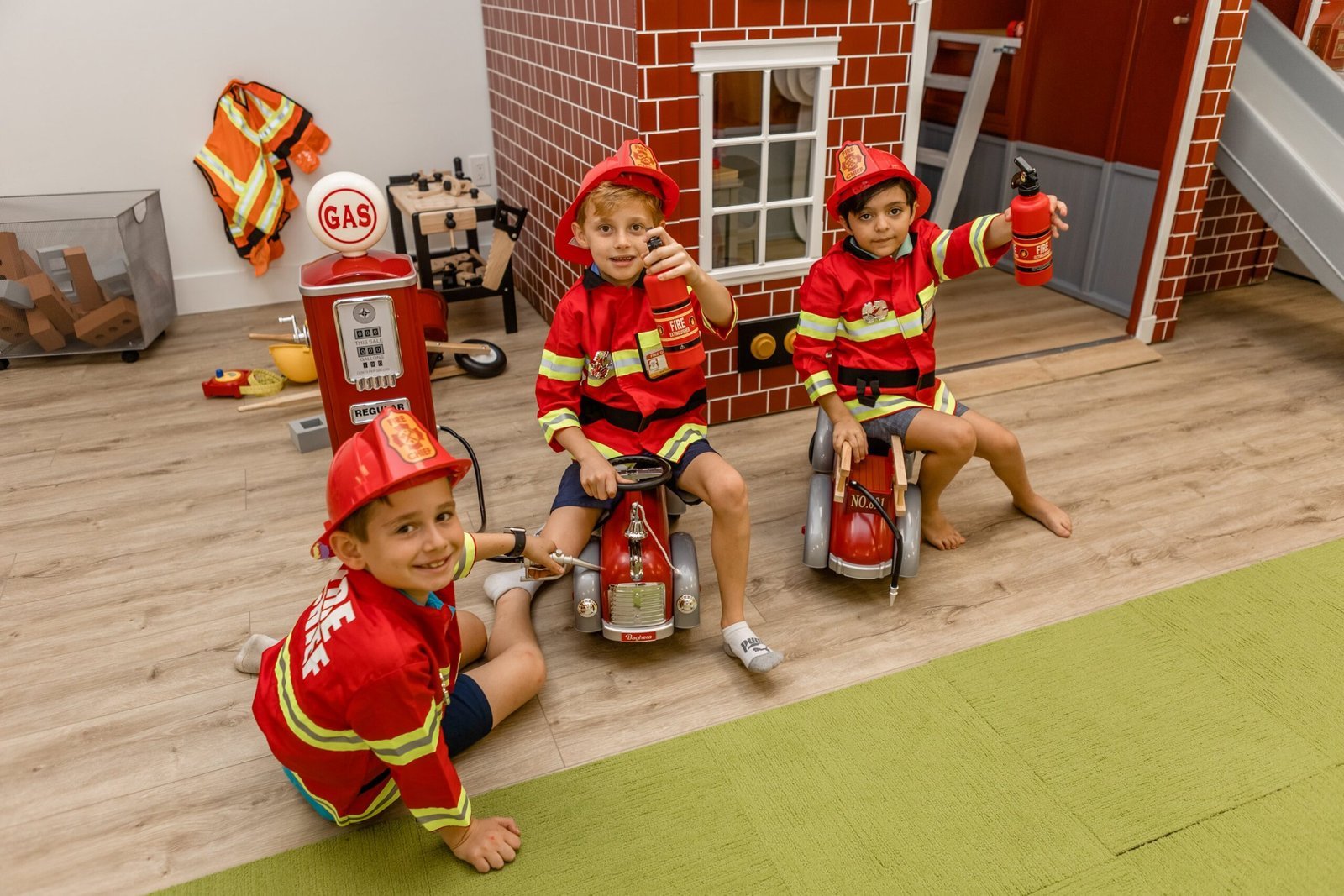Toddler engaged in pretend play at Kids Hideout indoor playground Fort Lauderdale