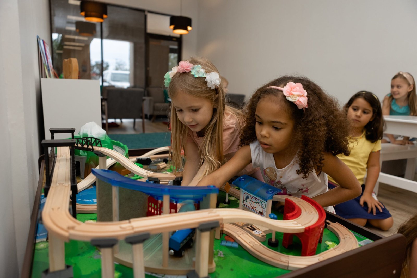 Kids playing at indoor playground during open play session at Kids Hideout Fort Lauderdale