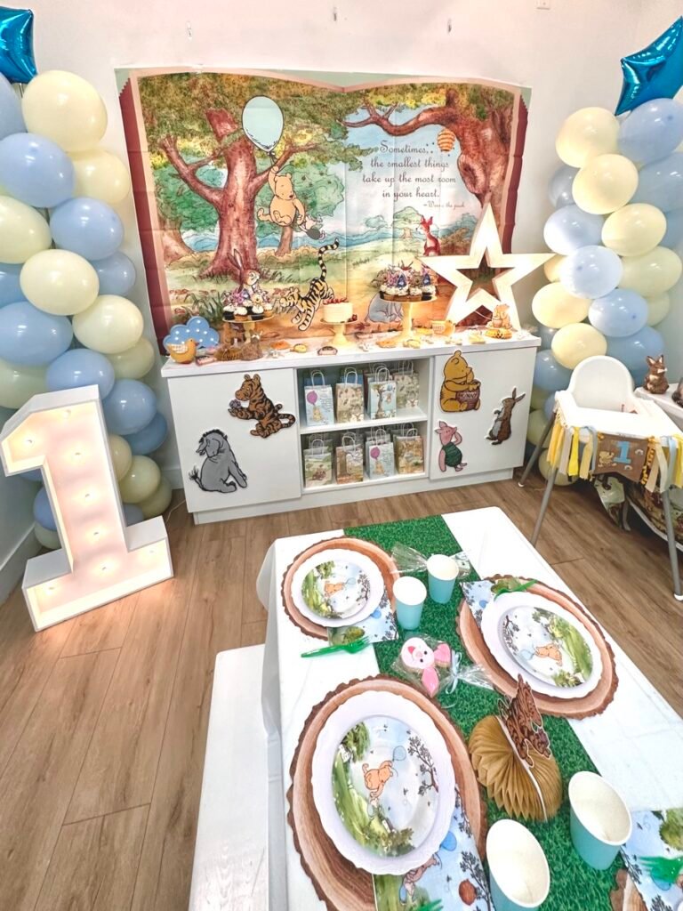 ONE Hundred Acre Wood Winnie the Pooh first birthday party theme with classic Pooh decorations at Kids Hideout Fort Lauderdale