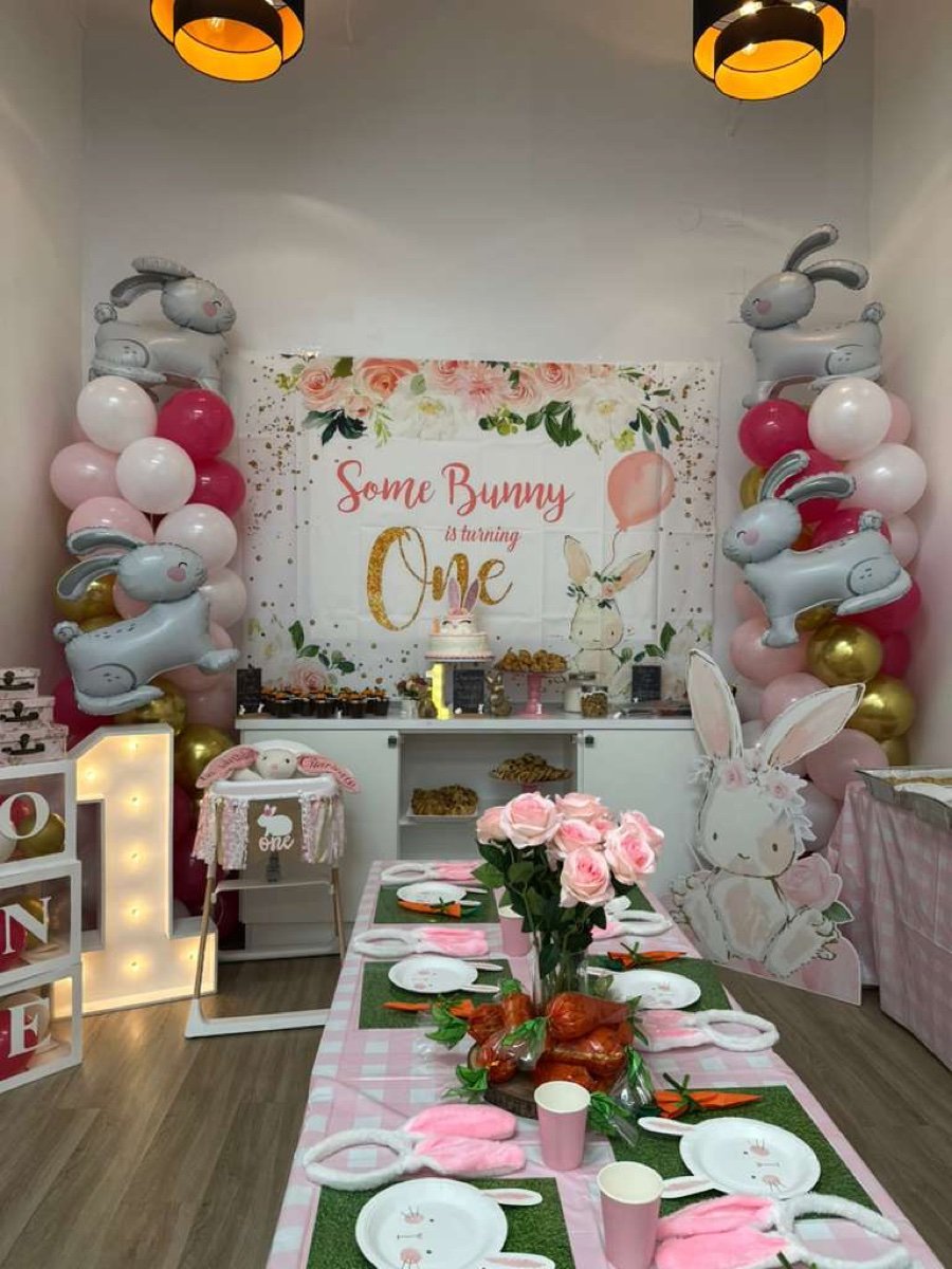 One Little Bunny first birthday party theme with floral decorations
