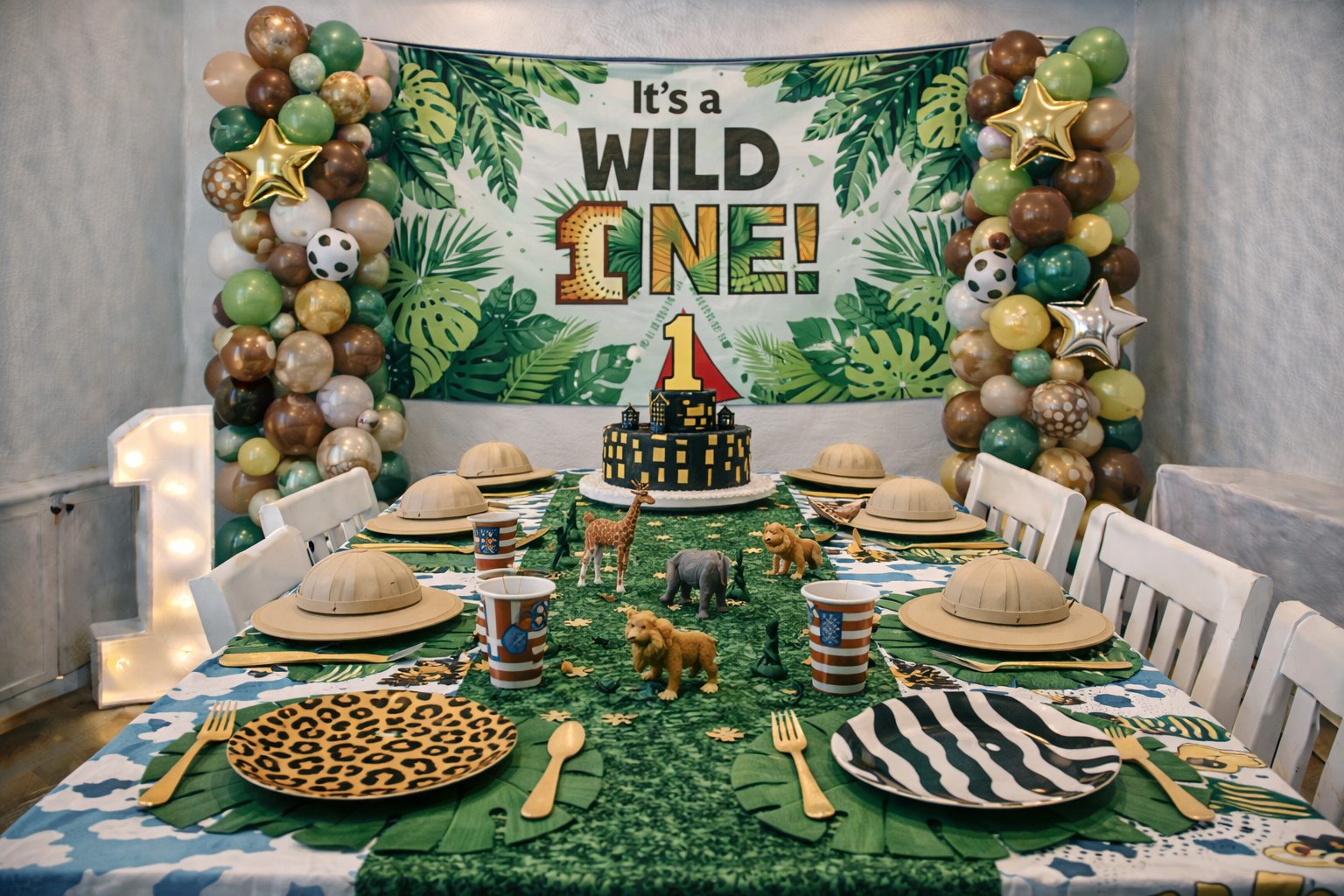 Safari adventure birthday party banner with jungle animals saying It Is a WILD ONE