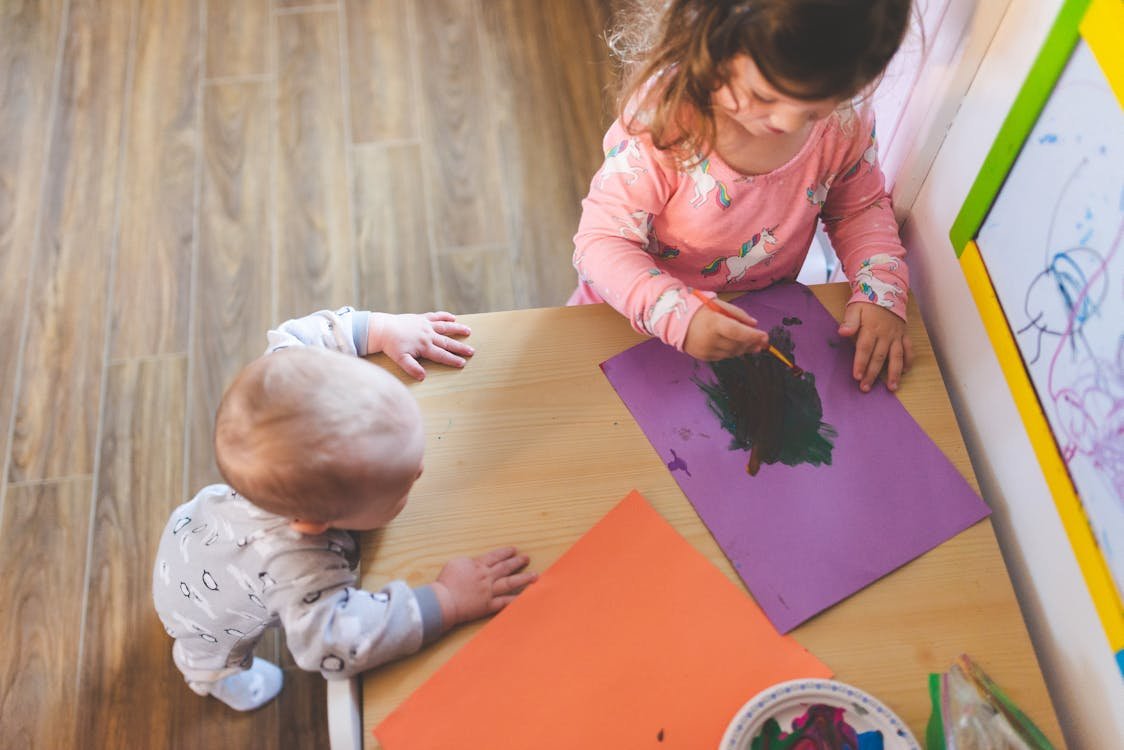 Toddler engaged in sensory play activity